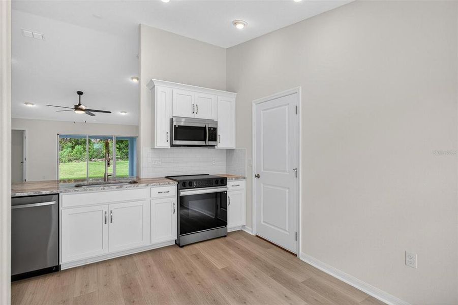 Furnished interior view inside a new home in , Palm Coast (Image 11).