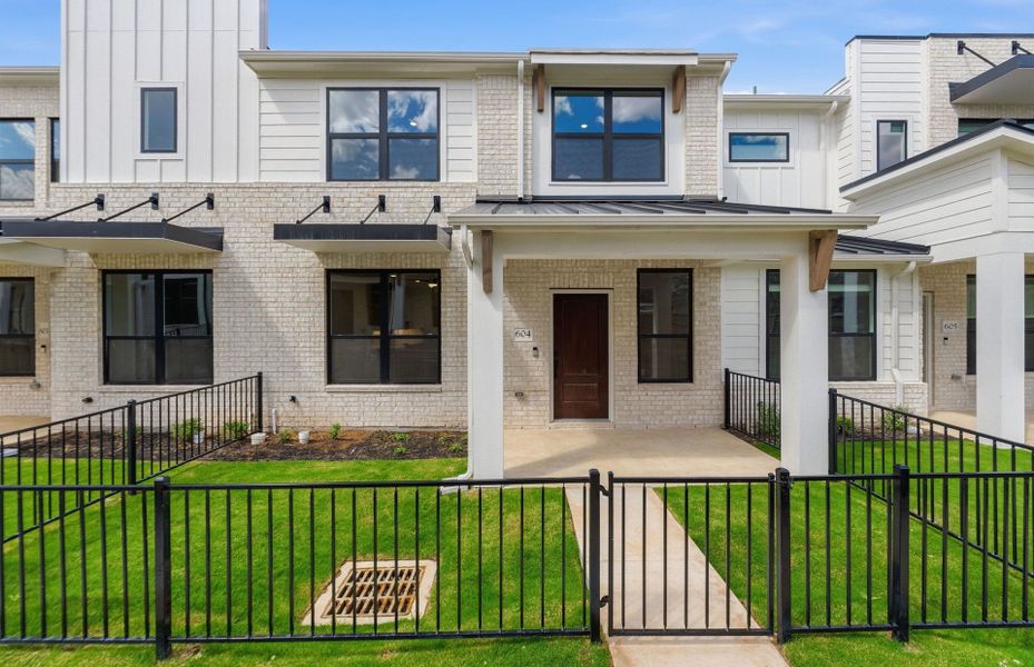 Exterior details and patio area of a home in Monarch on Main, Round Rock (Image 19).