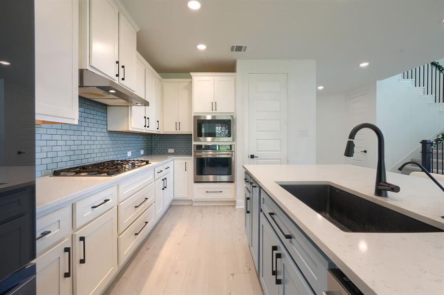 Furnished interior view inside a new home in , Fate (Image 9). Furnished interior view inside a new home in , Fate (Image 9).