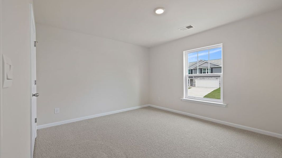 Spacious, unfurnished interior of a new home in Bentley Park, Greenwood (Image 26).
