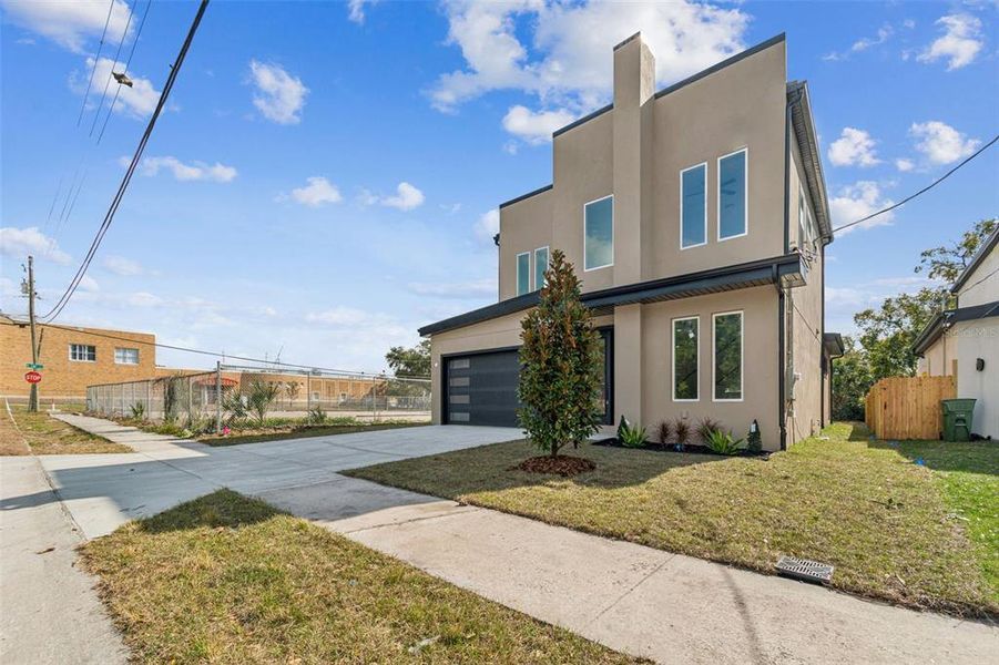 Front exterior of a new home in , Tampa, FL, highlighting curb appeal (Image 31).