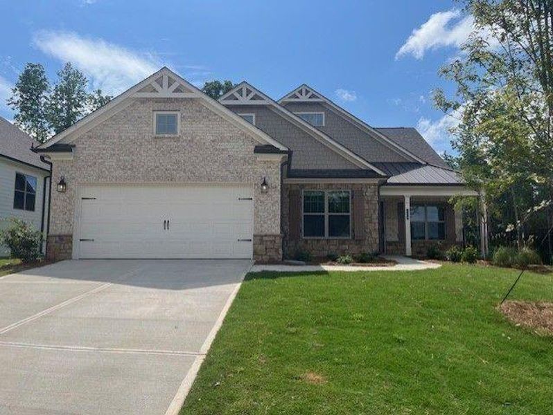 Front exterior of a new home in Soleil Belmont Park, Canton, GA, highlighting curb appeal (Image 2). Front exterior of a new home in Soleil Belmont Park, Canton, GA, highlighting curb appeal (Image 2).