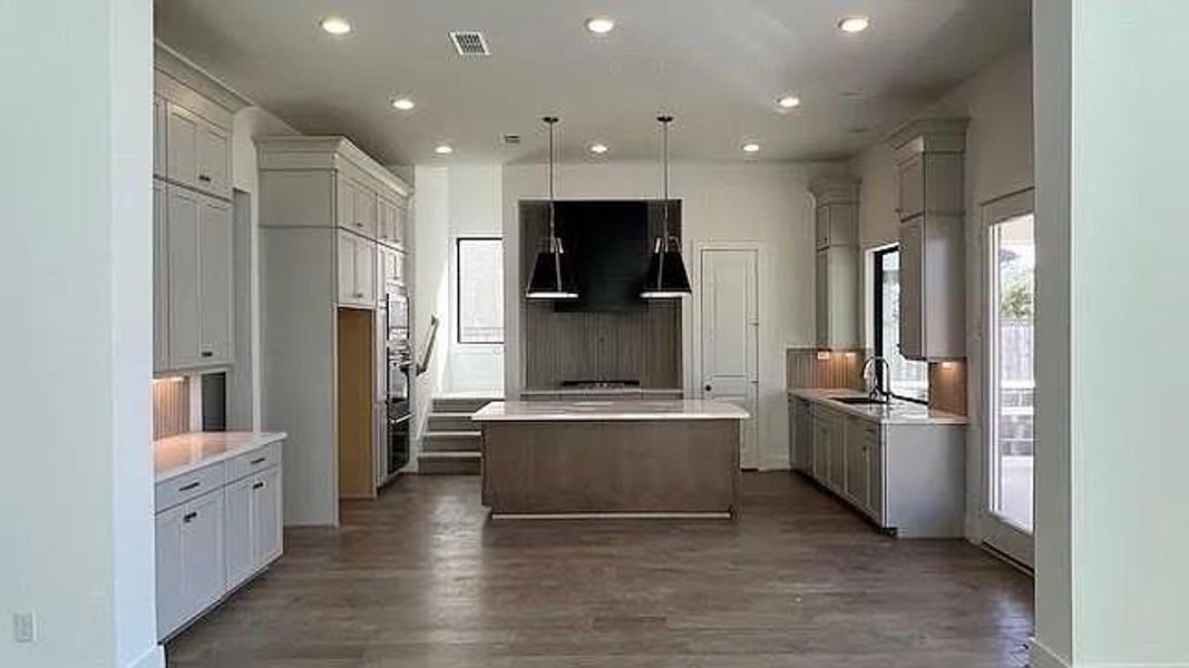 Furnished interior view inside a new home in Bridgeland 45', 50', 70', Cypress (Image 4).