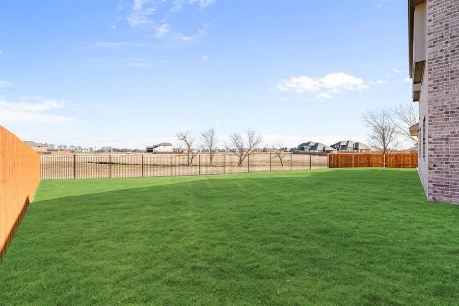 Exterior details and patio area of a home in Sunrise at Garden Valley, Waxahachie (Image 3).