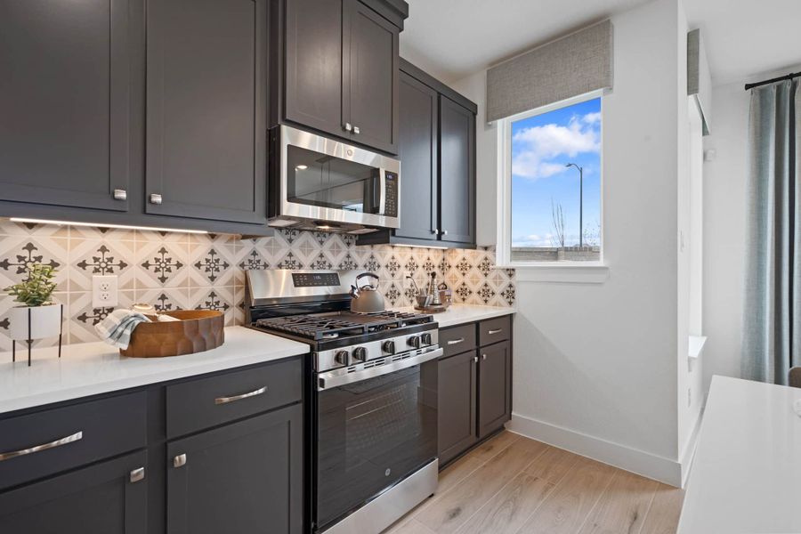 Furnished interior view inside a new home in Bridgeland, Cypress (Image 10).