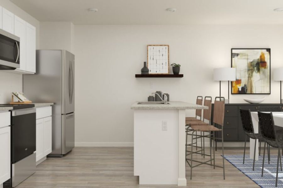 A kitchen with a table and chairs.