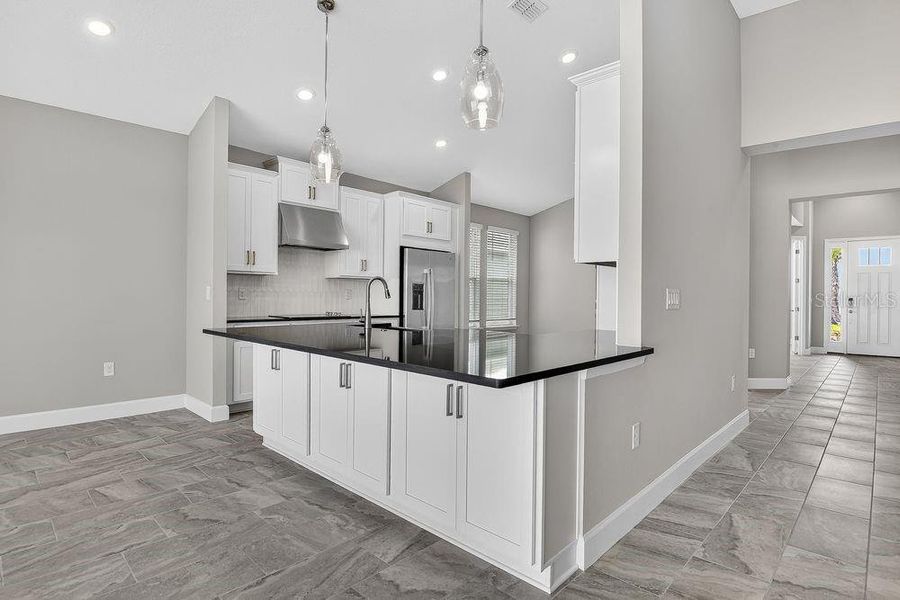 Furnished interior view inside a new home in Colbert Landings, Palm Coast (Image 7).