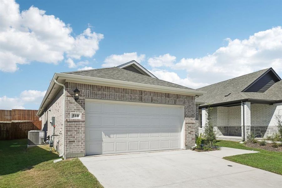 Front exterior of a new home in Eastridge - Spring Series, McKinney, TX, highlighting curb appeal (Image 2). Front exterior of a new home in Eastridge - Spring Series, McKinney, TX, highlighting curb appeal (Image 2).