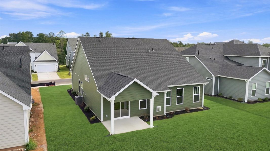 Established charm meets functional outdoor living with a spacious rear covered porch located in Seneca, SC
