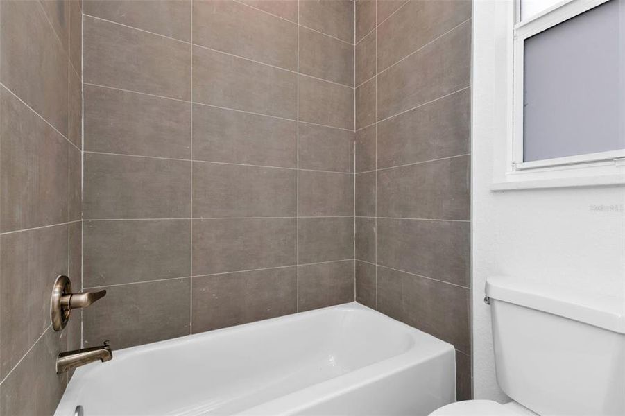 Furnished interior view inside a new home in , Punta Gorda (Image 17).