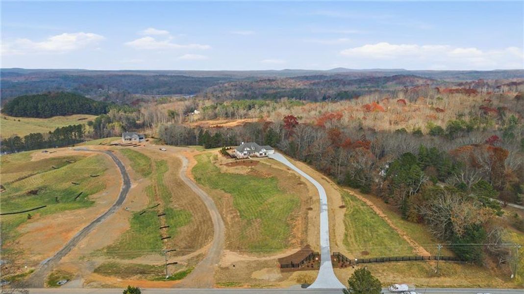 Front exterior of a new home in , Gainesville, GA, highlighting curb appeal (Image 34).