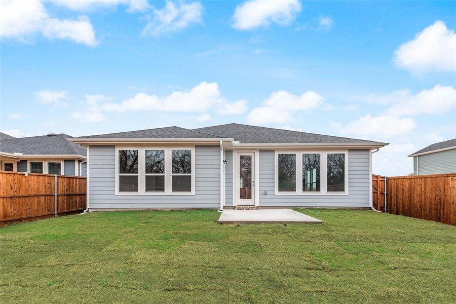 Exterior details and patio area of a home in Creekside of Crowley, Crowley (Image 3).