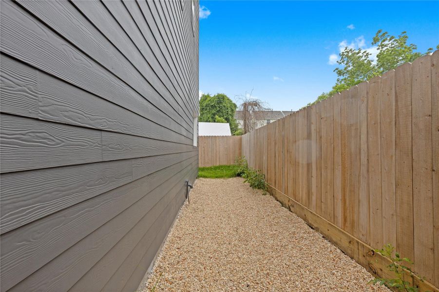 Exterior details and patio area of a home in , Houston (Image 14). Exterior details and patio area of a home in , Houston (Image 14).