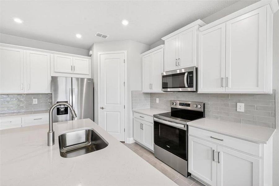 Furnished interior view inside a new home in Windwater, Parrish (Image 5).