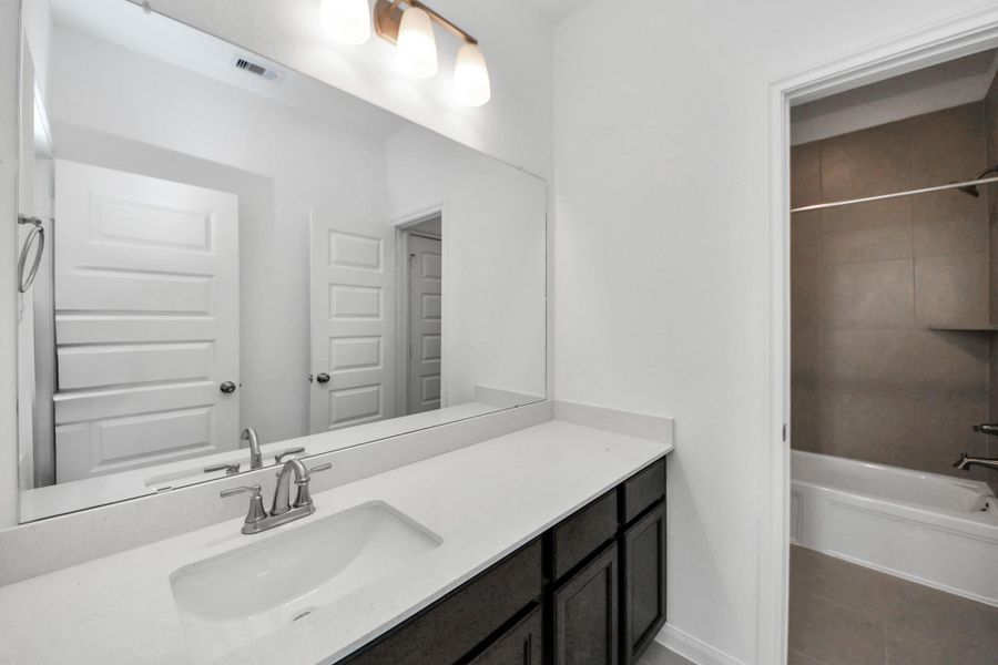 Furnished interior view inside a new home in 50' Traditional Homes at Elyson, Katy (Image 5).