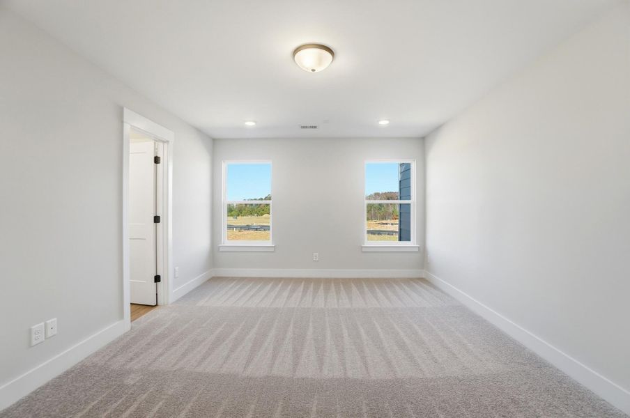 Spacious, unfurnished interior of a new home in Blythe Mill Townhomes, Waxhaw (Image 50).