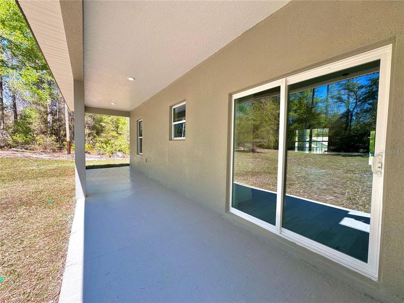 Exterior details and patio area of a home in , Citrus Springs (Image 22).