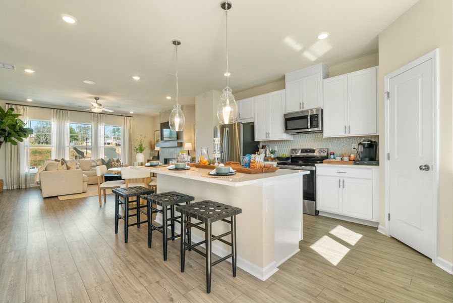 Representative furnished interior of a home built from the Forsyth by Taylor Morrison in Chandler Run, Tucker (Image 13).