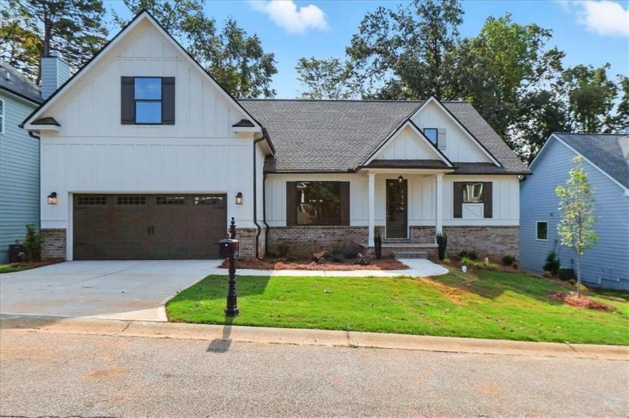 Front exterior of a new home in , Jefferson, GA, highlighting curb appeal (Image 24).