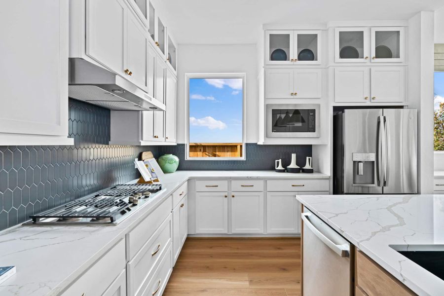 Representative furnished interior of a home built from the Lauren by Chesmar Homes in Wood Leaf Reserve, Tomball (Image 10).