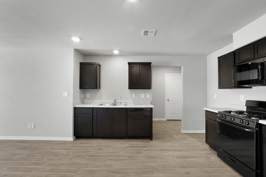 Furnished interior view inside a new home in Rancho Desierto Bello, Horizon City (Image 10).