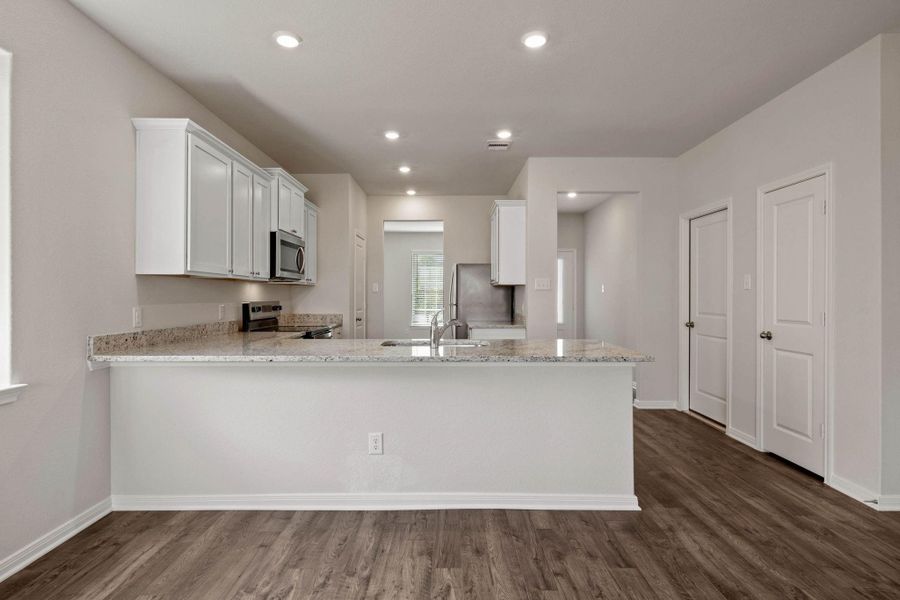 Furnished interior view inside a new home in Vacek Country Meadows, Richmond (Image 8).