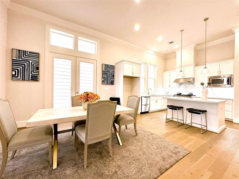 Dining Area has a side door that leads out to a gated-in area.