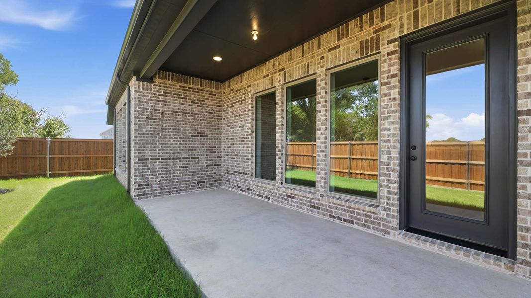 Exterior details and patio area of a home in Mustang Lakes, Celina (Image 4). Exterior details and patio area of a home in Mustang Lakes, Celina (Image 4).