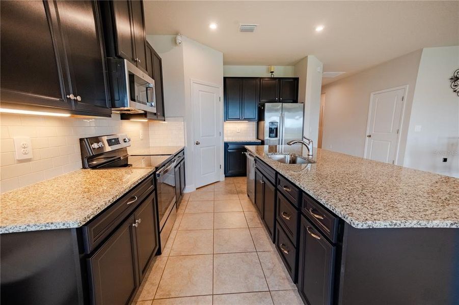 Furnished interior view inside a new home in , Port Charlotte (Image 13). Furnished interior view inside a new home in , Port Charlotte (Image 13).
