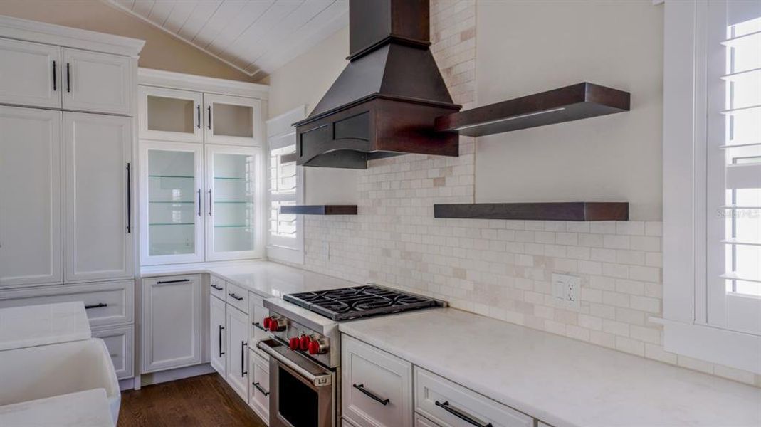 Full kitchen in apartment with gas stove