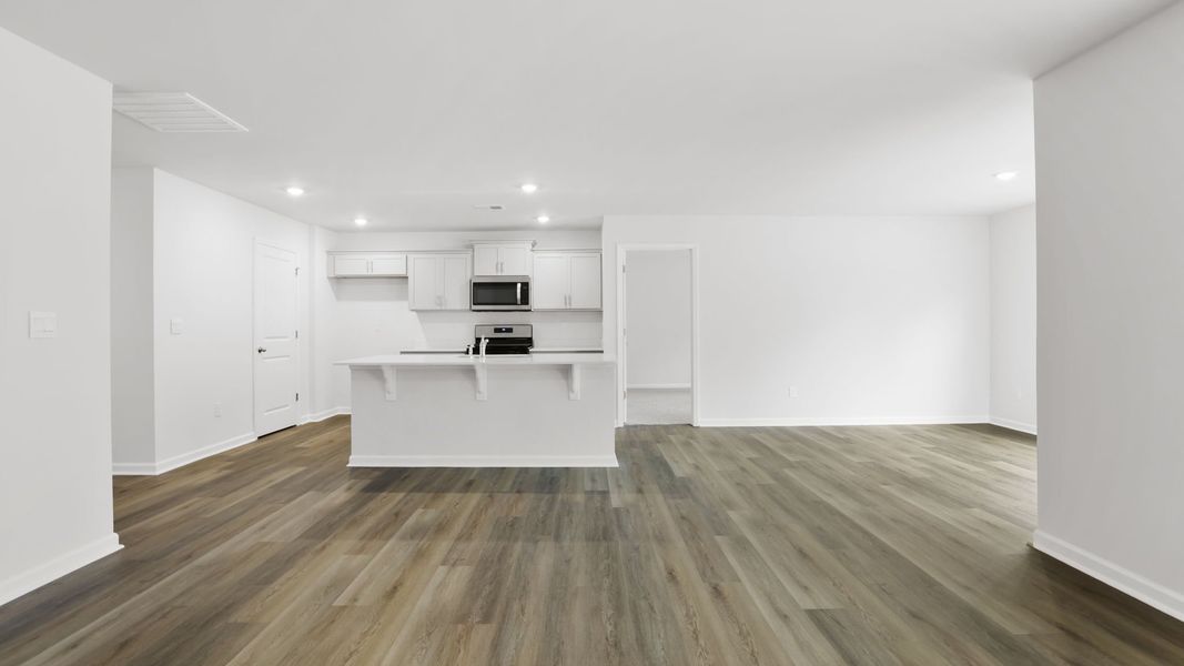 Spacious, unfurnished interior of a new home in Bentley Park, Greenwood (Image 20).