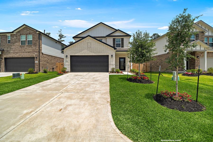 A driveway leading to a house. A driveway leading to a house.