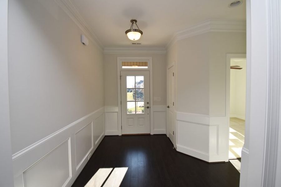 Representative unfurnished interior of a home built from the Cambridge by Keystone Homes NC in Weybridge, Burlington (Image 22).