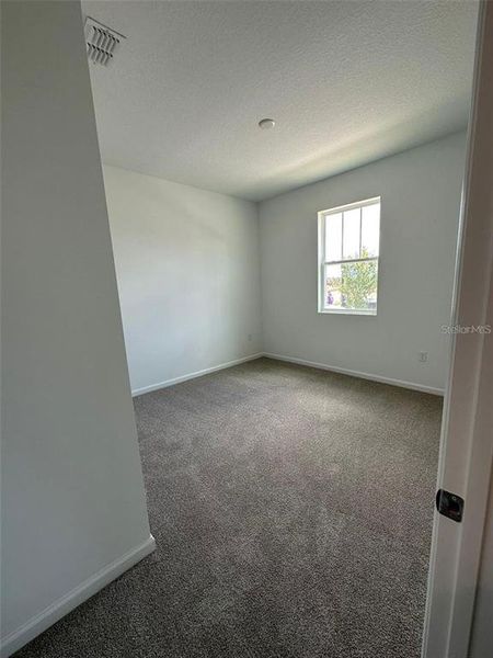Spacious, unfurnished interior of a new home in Soleil, Kissimmee (Image 18).