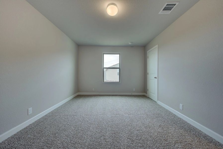 Representative unfurnished interior of a home built from the Cleburne by Ashton Woods in Mustang Oaks, San Antonio (Image 41).
