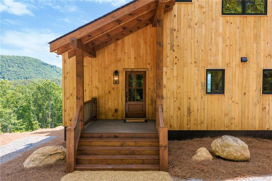 Exterior details and patio area of a home in , Ellijay (Image 32).