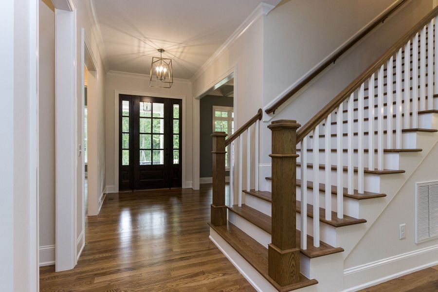 Representative unfurnished interior of a home built from the Shelby Tudor by Homes by Dickerson in Cattail, Clayton (Image 7).