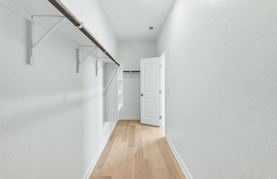 Representative unfurnished interior of a home built from the Hewitt by Centex in Vantage, San Marcos (Image 23).