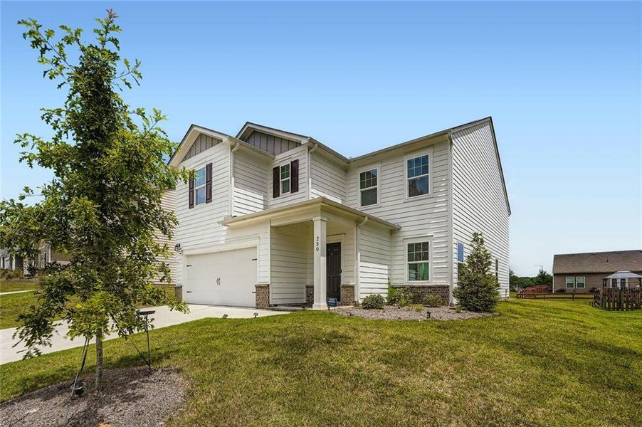 Front exterior of a new home in , Villa Rica, GA, highlighting curb appeal (Image 1). Front exterior of a new home in , Villa Rica, GA, highlighting curb appeal (Image 1).