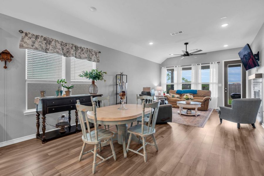 The main living area just off the kitchen has room for a dining area and plenty of natural light. The main living area just off the kitchen has room for a dining area and plenty of natural light.