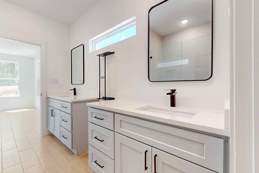 Bathroom with two vanities