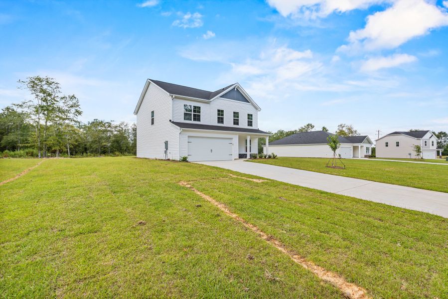 Front exterior of a new home in Forts Ridge, Pelion, SC, highlighting curb appeal (Image 20).
