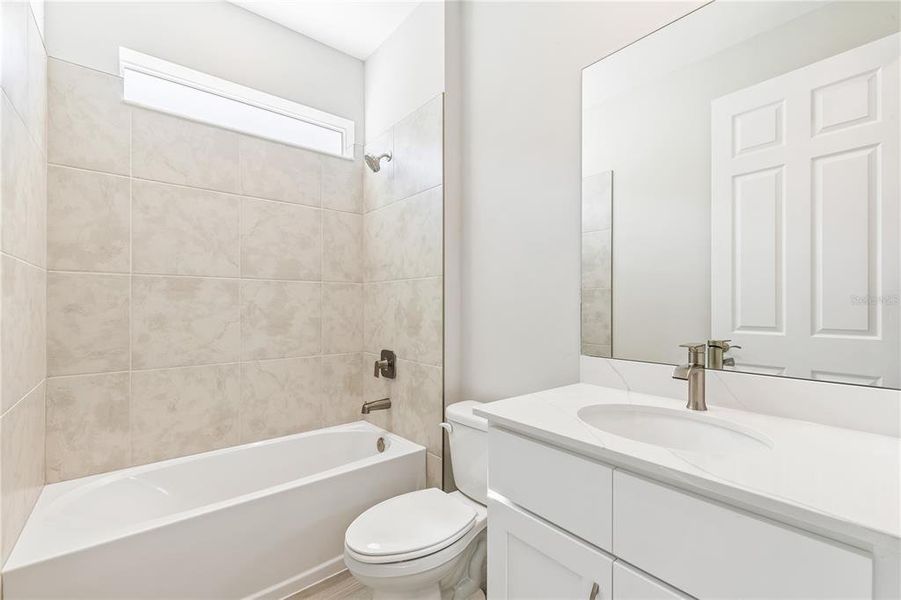 Furnished interior view inside a new home in Coral Lakes - Tradition & Express, Punta Gorda (Image 10).