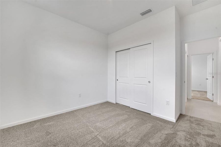 Spacious, unfurnished interior of a new home in Annabelle Estates, Winter Haven (Image 13).