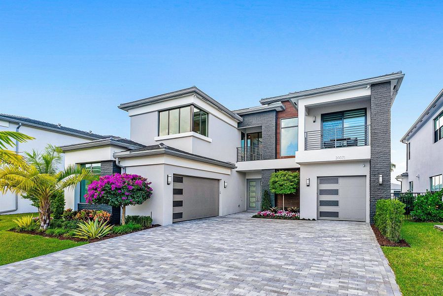Front exterior of a new home in , Boca Raton, FL, highlighting curb appeal (Image 30). Front exterior of a new home in , Boca Raton, FL, highlighting curb appeal (Image 30).