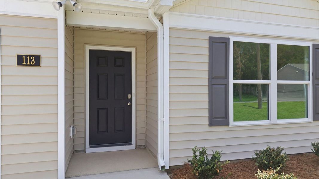 Exterior details and patio area of a home in Blair Ridge, La Grange (Image 3).