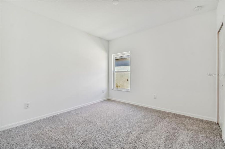 Spacious, unfurnished interior of a new home in The Hammocks at West Port, Port Charlotte (Image 6).