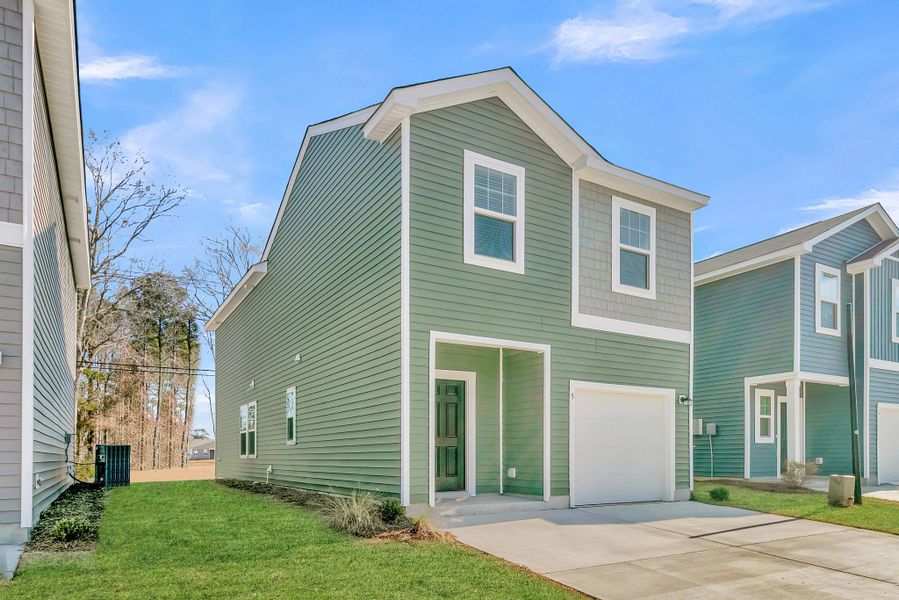 Representative exterior photo of a completed home built from the Ross by Starlight Homes in Pinckney Place, North Charleston, SC (Image 2). Representative exterior photo of a completed home built from the Ross by Starlight Homes in Pinckney Place, North Charleston, SC (Image 2).