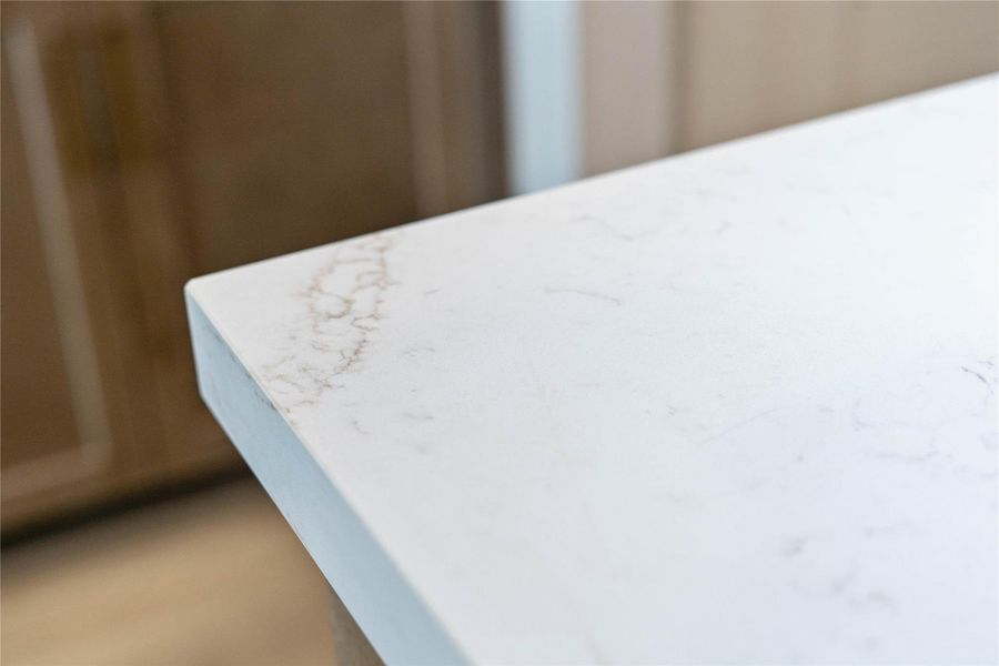 Quartz is incredibly tough and engineered to resist scratches, chips, and cracks from daily wear and tear. This ensures the surface retains its pristine condition for decades.