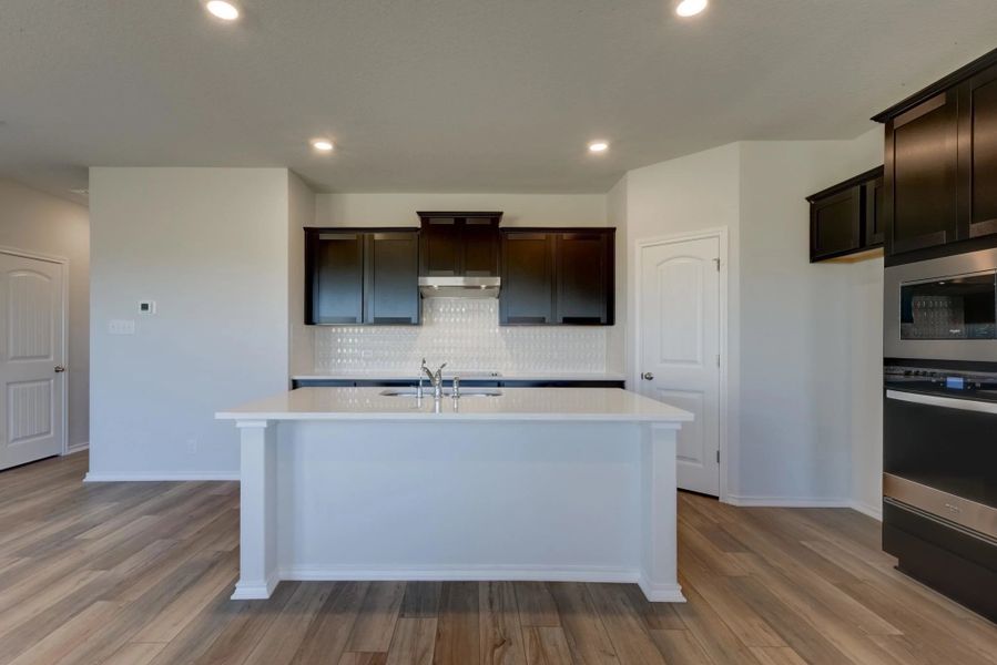 Representative furnished interior of a home built from the Dunlap by Ashton Woods in Hennersby Hollow, San Antonio (Image 8). Representative furnished interior of a home built from the Dunlap by Ashton Woods in Hennersby Hollow, San Antonio (Image 8).
